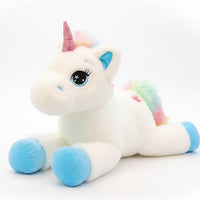 Liggende regenboog eenhoorn knuffel