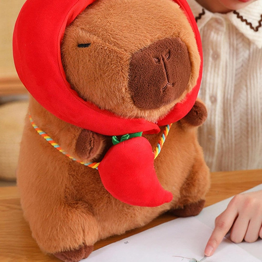 Capybara knuffel met hoed en groentetas