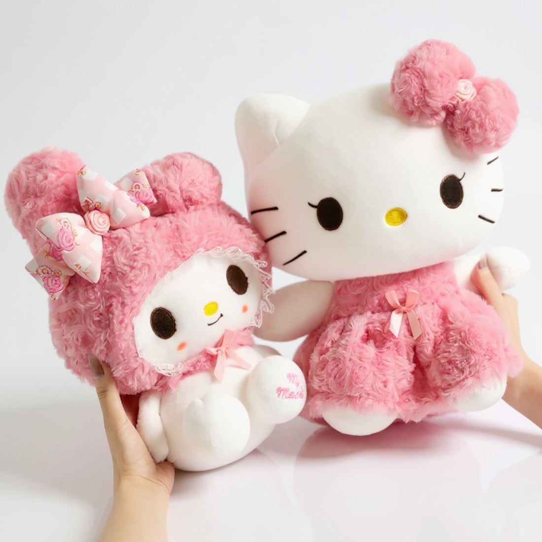 Hello Kitty en My Melody knuffel in roze outfit