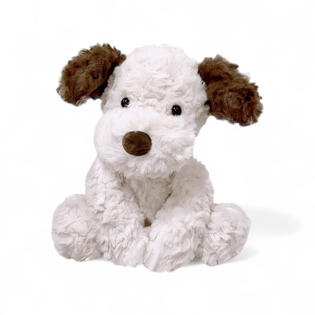 Crèmekleurige hond knuffel met bruine oren