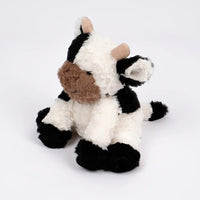 Mooie zachte kleurrijke koe knuffel