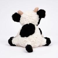 Mooie zachte kleurrijke koe knuffel
