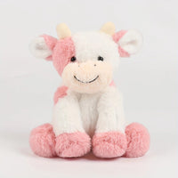 Mooie zachte kleurrijke koe knuffel