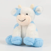 Mooie zachte kleurrijke koe knuffel