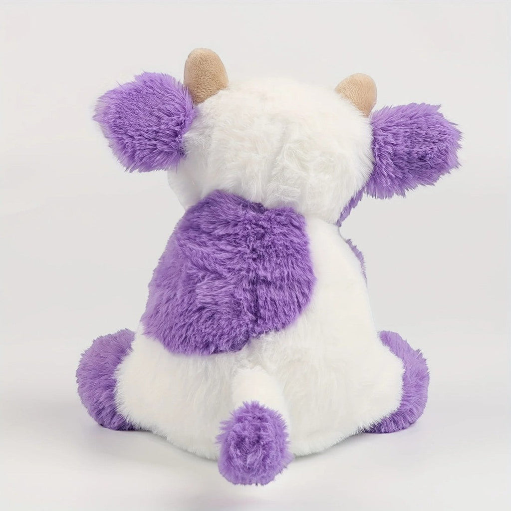 Mooie zachte kleurrijke koe knuffel