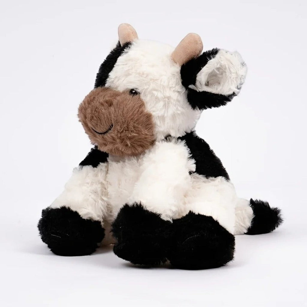 Mooie zachte kleurrijke koe knuffel