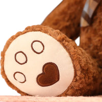 Traditionele krullende beer knuffel met retro strik