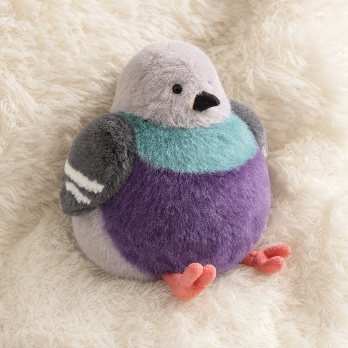 Mollige paarse duif knuffel