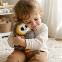 Donzige uil knuffel met grote ogen
