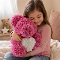 Roze rozenbeer knuffel met wit hart