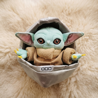 Baby Yoda knuffel in wieg 23 cm
