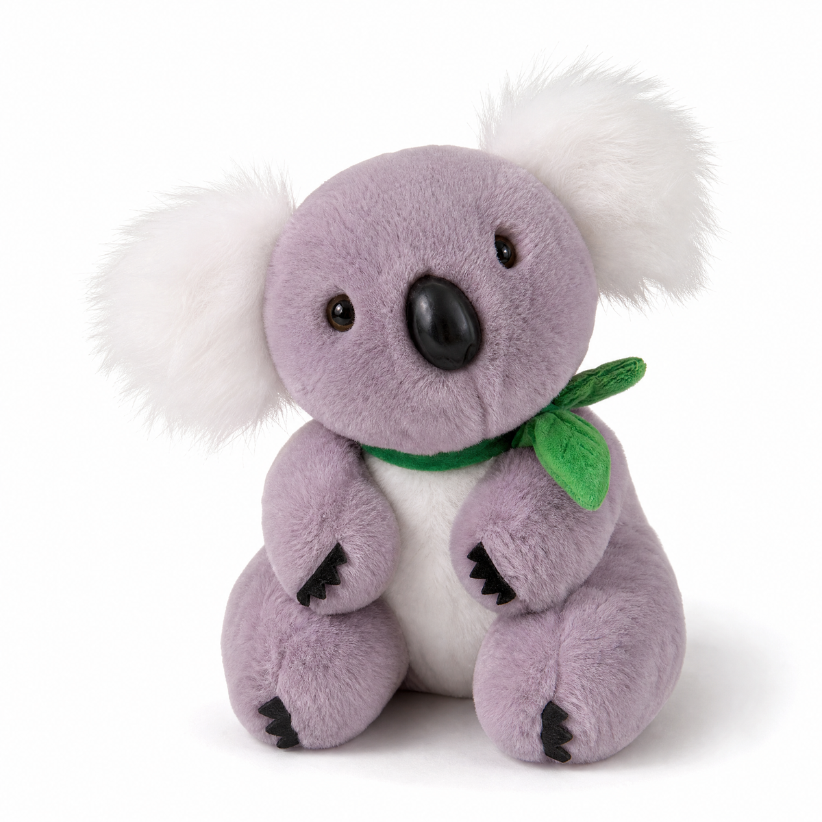 Grijs-witte koala knuffel met eucalyptusblad