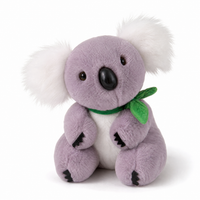 Grijs-witte koala knuffel met eucalyptusblad