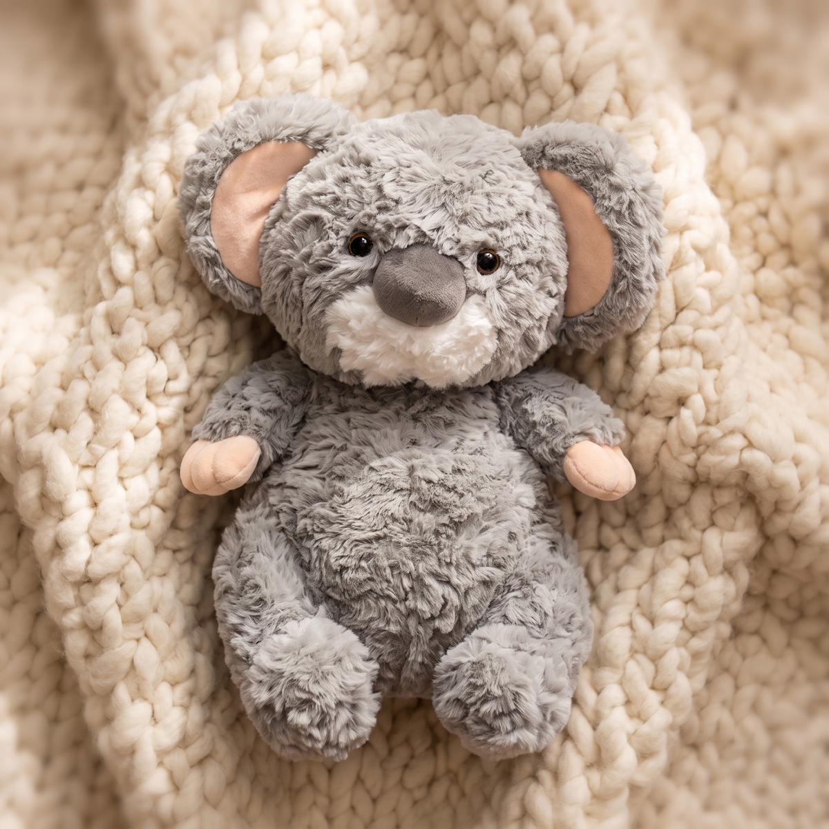 Grijze koala knuffel met eucalyptusblad 35 cm