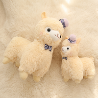Lama knuffel met hoed en vlinderstrik