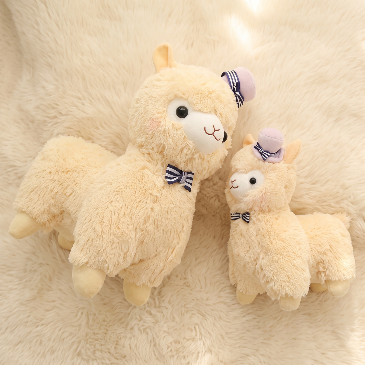 Lama knuffel met hoed en vlinderstrik