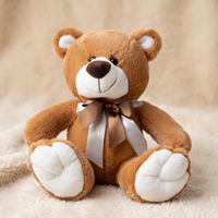 Bruine beer knuffel met satijnen strik