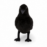 Realistische zwarte raaf knuffel